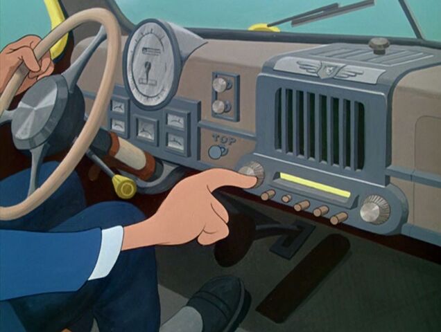 File:Mr. Wheeler pushing the car buttons.jpg