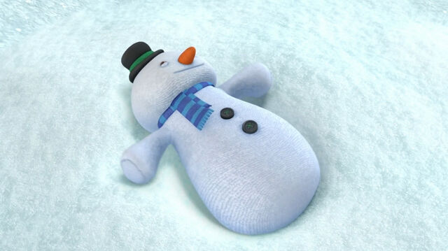 File:Chilly makes a snow angel.jpg