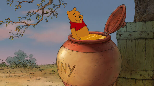 File:Winnie the Pooh is getting in the giant honey pot.jpg
