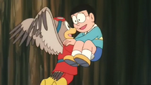 Gusuke bay đỡ Nobita.png