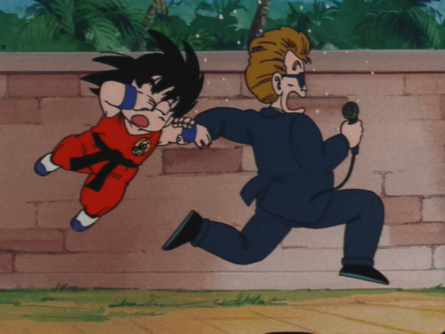 File:AnnouncerTakingGoku.png