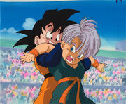 Son Goten exécute le Full Nelson sur Trunks