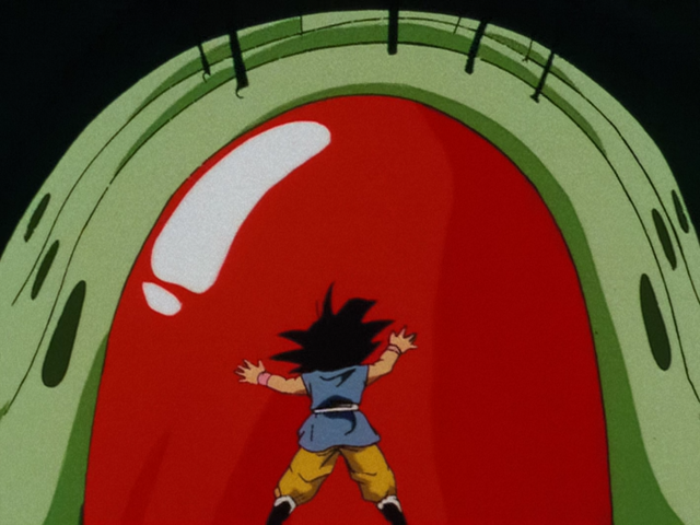 File:Mouma attacks goku.png