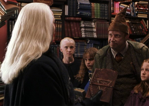 Lucius enfrentándose a Arthur