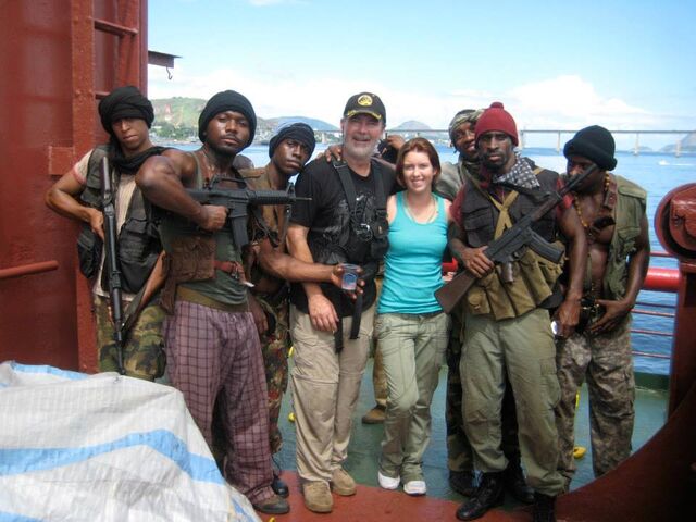 File:Expendables stunt guys Andy Gill & Kelly Meghan Gill along with the pirate stunt team.jpg