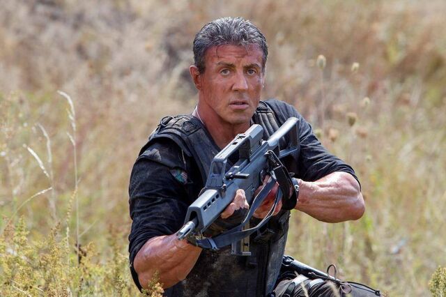 File:EX3- Stallone as Barney Ross ready for action.jpg