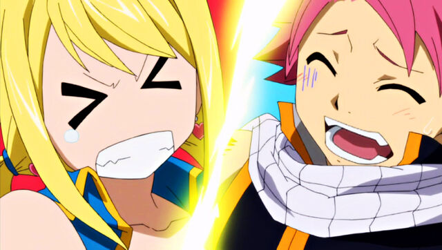 File:Natsu steps on Lucy while dancing.jpg