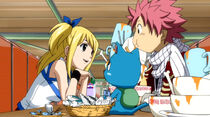 Lucy treating Natsu and Happy to dinner.jpg