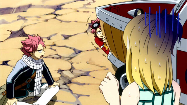 File:Dragneel tells Lucy to not scare Dragion.jpg