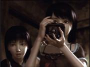 180px-Mio Mayu Camera.jpg