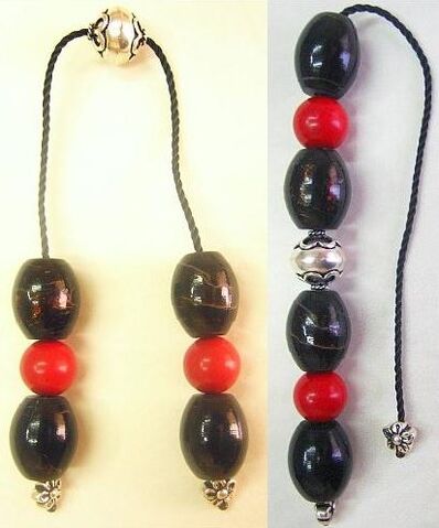 File:Black-red-coral-beads.jpg