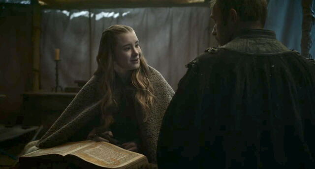 File:Shireen reads Munkun's book.jpg