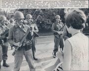 Anti-War Protester Faces Off With National Guardsmen Wearing M9A1 Gas Masks