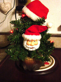 Gemmy animated santa claus in christmas tree 2