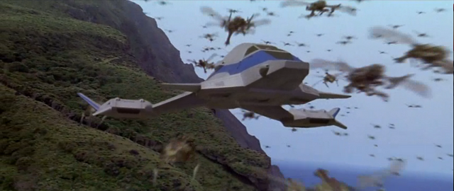 File:Godzilla vs. Megaguirus - Hundreds of Meganulas fly past the Griffon.png