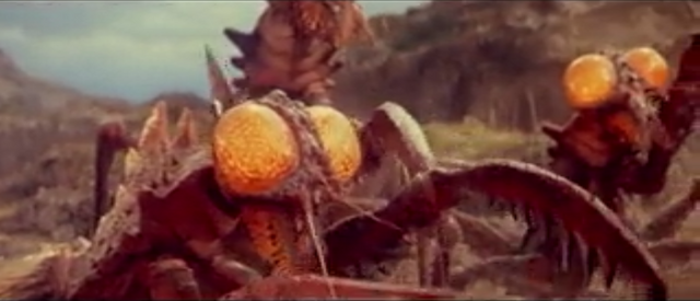 File:All Monsters Attack - Kamacuras appears in stock footage.png