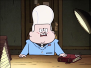 File:Gideon in his desk.png