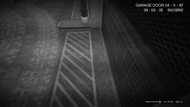 File:CCTV GTAOe GarageDoor.jpg