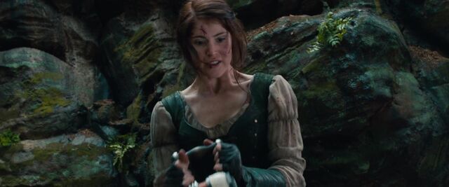 File:Gretel holds the taser.jpg
