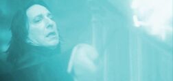 Severus Snape casting Avada Kedavra on Albus Dumbledore.jpg