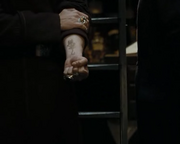 Karkaroff showing Snape his mark.png