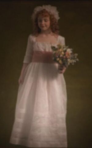 File:Girl with flowers.jpg