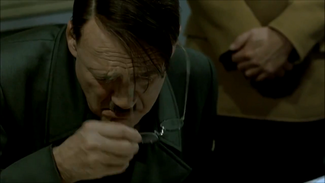 File:Hitler takes off glasses.png