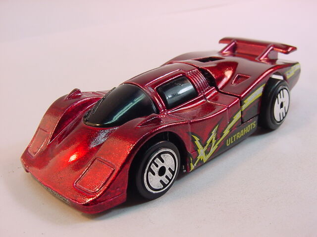 File:1985 Mtl red- metal base-UH 3Pak.jpg