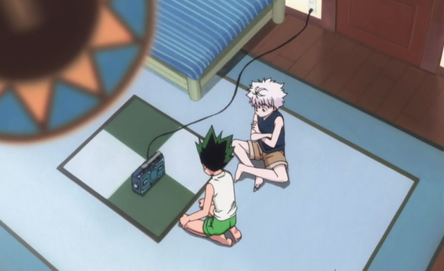 Archivo:Gon y Killua escuchando la cinta.png
