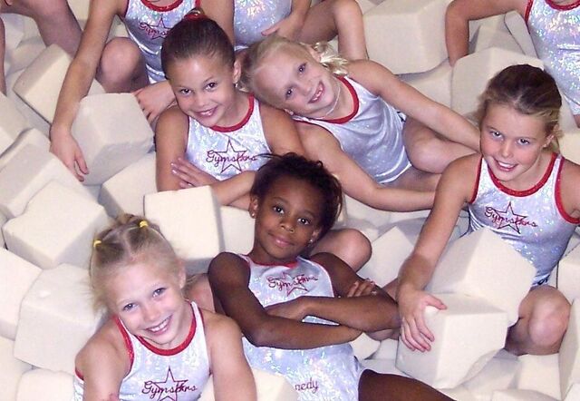 File:Olivia with Gymnastics Team.jpg