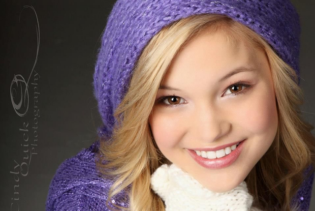File:Olivia Wearing Purple Hat.png
