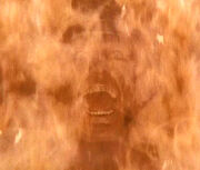Belloq on fire.jpg