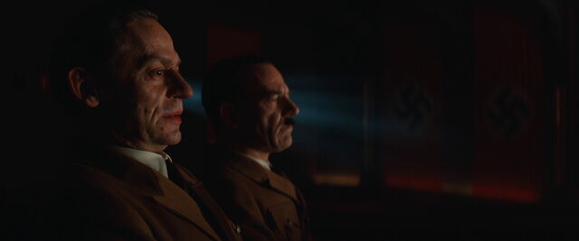 File:Goebbels and Hitler look at the film.jpg