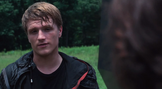 Peeta talking to Katniss
