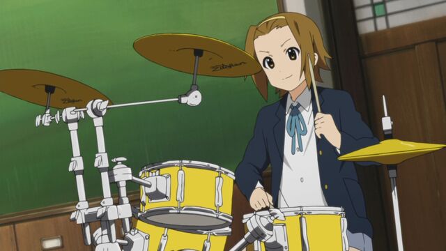 File:Ritsu playing drums.jpg