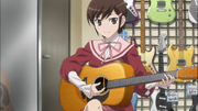 Chihiro testing the guitar