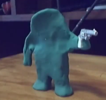 File:Klayman with gun.PNG