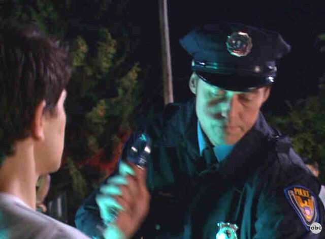 File:CopHandcuff.jpg