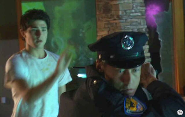 File:CopKyleTakesBaton.jpg