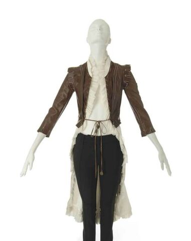 File:A brown leather jerkin with white cotton drill tails alexander mcqueen d5583364h.jpg