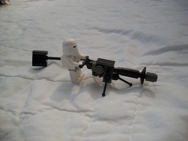 File:Snowtrooper Manning Repeating E-blaster.jpg
