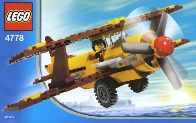 File:Yellow and Brown Biplane.jpg