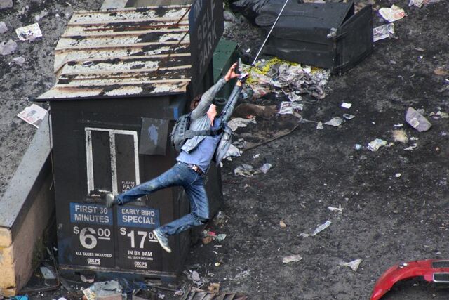 File:Transformers-dotm-tf3-shia-labeoufs-stunt-double-swings-on-cable 4906207881 o.jpg