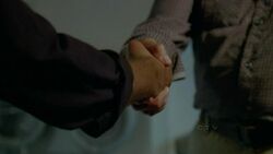 6x08 Handshake.jpg
