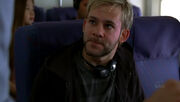 1x02-CharlieOnPlane.jpg