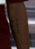 ملف:3x13 Kincaid tattoo.png