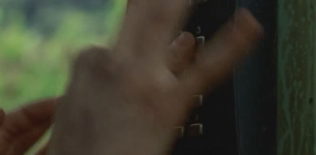 File:4x09 Alex pressing 3.jpg
