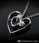 Heart-shaped-pendant-with-2-diamonds