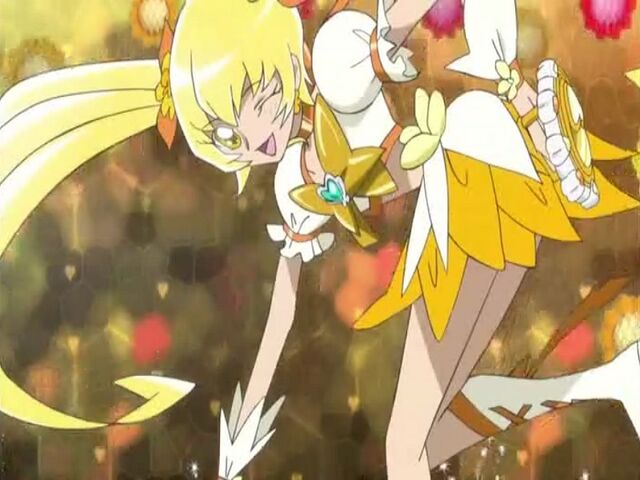 File:Heartcatch Pretty Cure! Cure Sunshine in the Gold Forte Burst attack.jpg