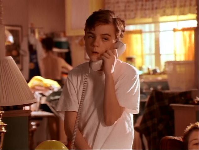 File:Malcolm on the phone.png